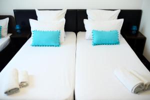 Postel nebo postele na pokoji v ubytování Pension Iory`s