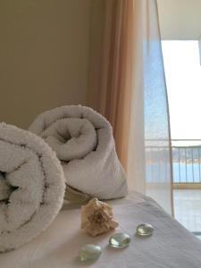 Ένα ή περισσότερα κρεβάτια σε δωμάτιο στο Fedra Apartments +55 φωτογραφίες