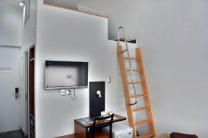 TV a/nebo společenská místnost v ubytování Natalino Hotel Patagonia