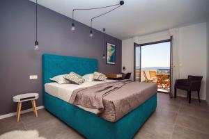 Postel nebo postele na pokoji v ubytování Villa Soriano + 37 fotografií