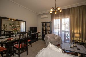 TV a/nebo společenská místnost v ubytování Lia's Center Apartment