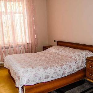 Postel nebo postele na pokoji v ubytování ElVin