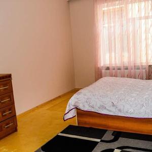 Postel nebo postele na pokoji v ubytování ElVin
