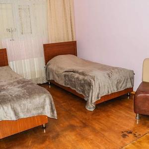 Postel nebo postele na pokoji v ubytování ElVin