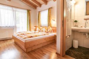 Postel nebo postele na pokoji v ubytování Landhaus Sonnblick