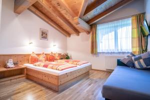 Postel nebo postele na pokoji v ubytování Landhaus Sonnblick
