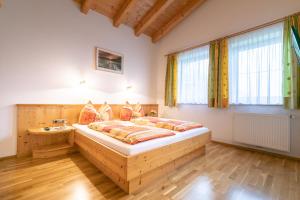 Postel nebo postele na pokoji v ubytování Landhaus Sonnblick