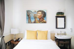 Letto o letti in una camera di Paia Inn
