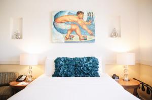 Letto o letti in una camera di Paia Inn
