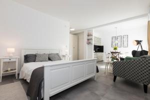 Posteľ alebo postele v izbe v ubytovaní Valbay Residence