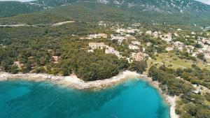 an aerial view of an island in the water at Apartments Galboka in Nerezine