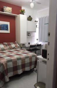Rúm í herbergi á Cosy studio in Copacabana
