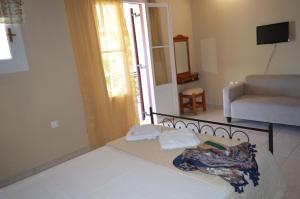 A bed or beds in a room at Vanessa Studios