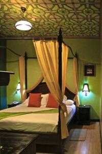 Postel nebo postele na pokoji v ubytování Morenica del Rosario
