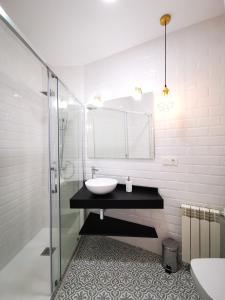 Koupelna v ubytování Rua Suites Boutique