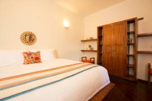 Postel nebo postele na pokoji v ubytování Casa LunaLoma - Boutique Apartments
