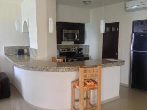 A kitchen or kitchenette at Hotel Bogavante