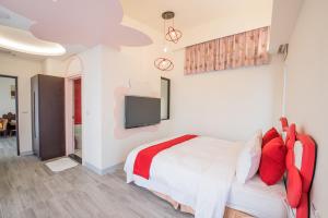 TV o dispositivi per l'intrattenimento presso Shangri Longluan Lake One B&B