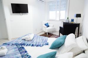 A bed or beds in a room at MiKlod Apartments