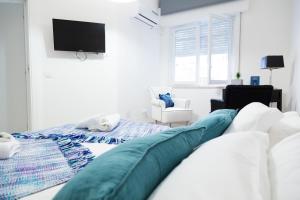 A bed or beds in a room at MiKlod Apartments