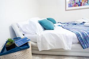 A bed or beds in a room at MiKlod Apartments