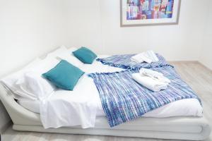 A bed or beds in a room at MiKlod Apartments