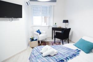 A bed or beds in a room at MiKlod Apartments