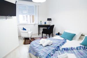 A bed or beds in a room at MiKlod Apartments