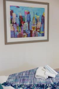 A bed or beds in a room at MiKlod Apartments