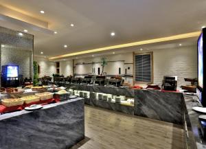 Μια τηλεόραση ή/και κέντρο ψυχαγωγίας στο Byland Star Hotel
