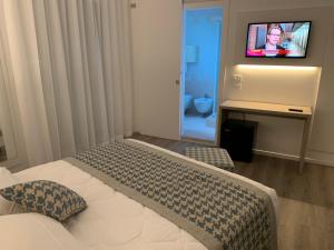 Postel nebo postele na pokoji v ubytování Hotel Jet