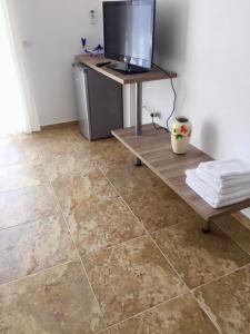 TV a/nebo společenská místnost v ubytování Camere vista mare