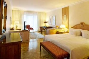 Postel nebo postele na pokoji v ubytování Colombi Hotel