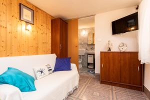 Kuchyňa alebo kuchynka v ubytovaní Apartman Verbenia + 20 fotografií