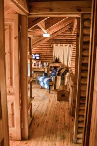 Posezení v ubytování Clarens Log Cabin