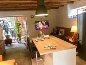 Telewizja i/lub zestaw kina domowego w obiekcie Villa Evy