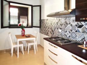 Η κουζίνα ή μικρή κουζίνα στο Casa Vacanze Donna Lucia