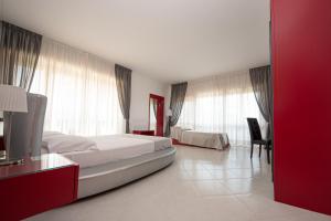 Postel nebo postele na pokoji v ubytování Resort la Magnolia