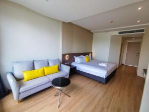 Postel nebo postele na pokoji v ubytování De VeraNiO Resort
