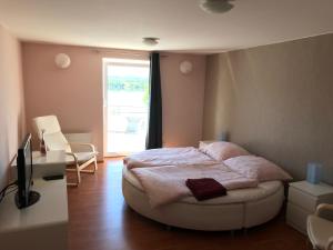 Postel nebo postele na pokoji v ubytování Beach Pension
