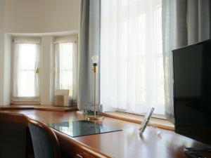 TV a/nebo společenská místnost v ubytování Stadthaus Valentin