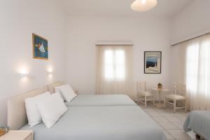 Postel nebo postele na pokoji v ubytování Hotel Charissi