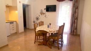 Kuchyň nebo kuchyňský kout v ubytování Apartmani Bambolina i Zala