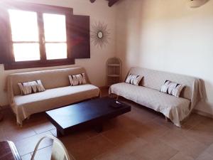 Postel nebo postele na pokoji v ubytování La Peonia