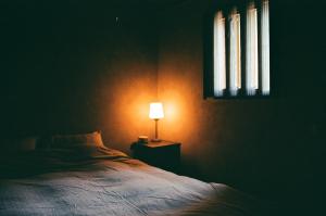 Postel nebo postele na pokoji v ubytování Dwell in Quemoy Homestay