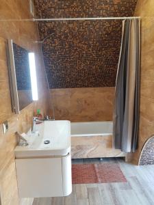 
Ванная комната в Guest House Kalyaeva
