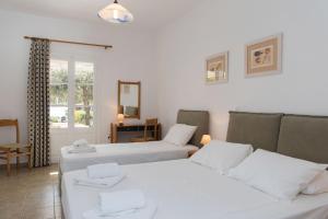 Postel nebo postele na pokoji v ubytování Agrilia Apartments & Studios