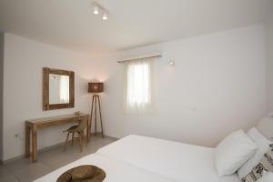 Postel nebo postele na pokoji v ubytování Hotel Charissi