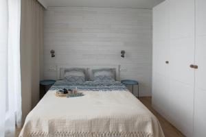Postel nebo postele na pokoji v ubytování Apartament Zefir Mechelinki