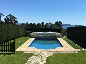 The swimming pool at or close to Beautiful house in Cangas near the beach